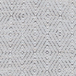 Handwoven rug in a geometric diamond pattern in white and grey. 