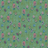 Scaled-out view of wallpaper in a varied floral print on a wood-grain field in shades of pink, yellow, blue and green.