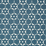 Fabric in a floral lattice print in cream on a navy field.