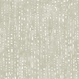 Detail of wallpaper in a painterly small-scale dashed dot print in white on a soft green watercolor field.