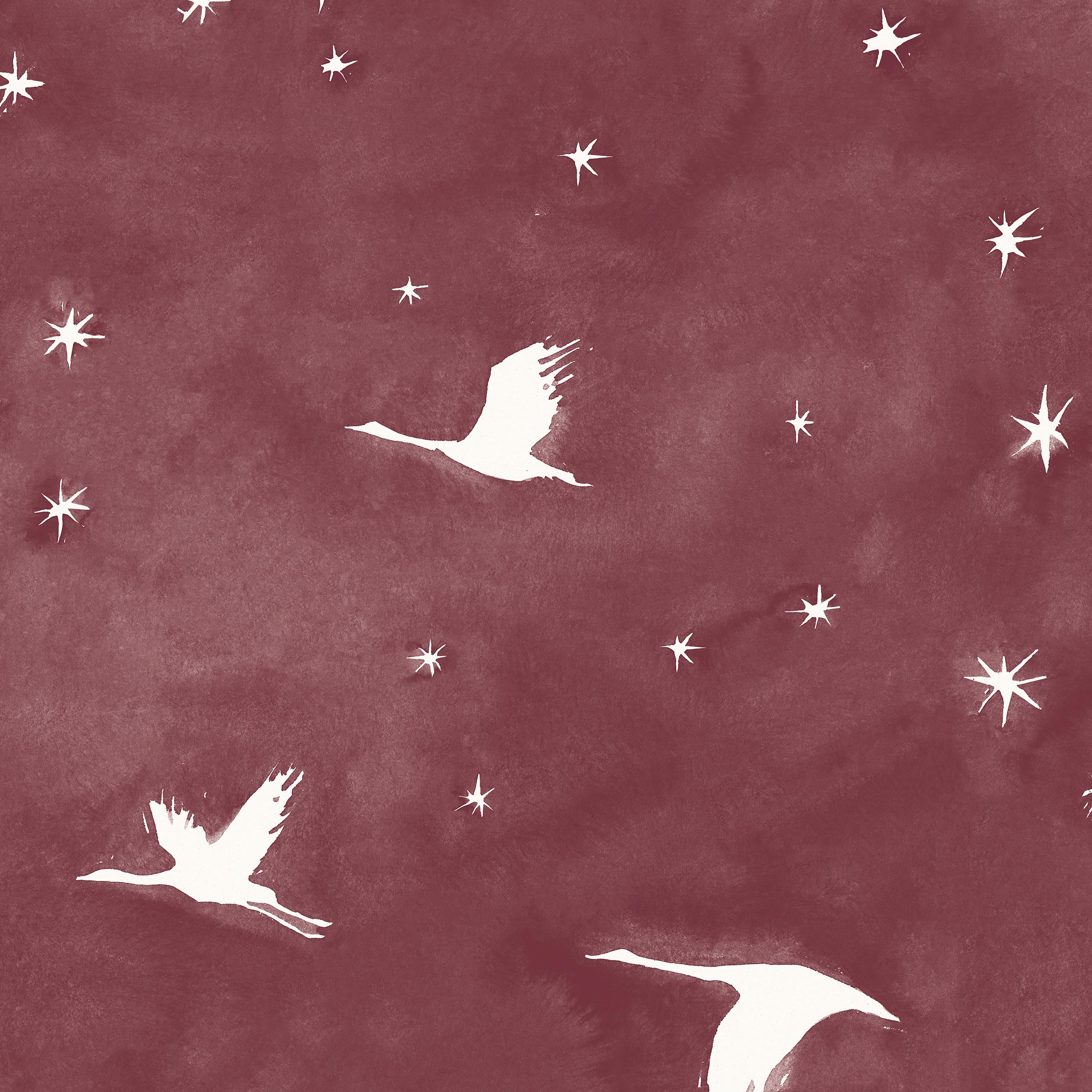 Detail of wallpaper in a repeating print of birds and stars in white on a crimson red watercolor field.