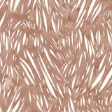 Detail of wallpaper in an abstract leaf pattern in white on a terracotta watercolor field.