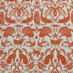 Patterned fabric with animals and sea creatures in orange on a white background