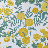Floral pattern with yellow flowers and green leaves on a white background