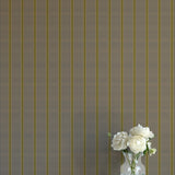 Striped wallpaper with a vase of flowers on a plain surface
