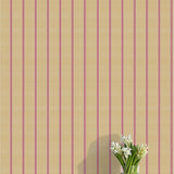 Striped wallpaper with a vase of flowers on a flat surface