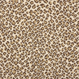 A close-up of a leopard print broadloom in brown and tan spots on a cream background.