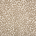 A close-up of a leopard print broadloom in beige and tan spots on a cream background.