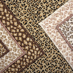 A close-up of a leopard print broadloom carpets in a range of neutral colors