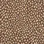 A close-up of a leopard print broadloom in brown and cream spots on a brown background.
