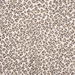 A close-up of a leopard print broadloom in beige and grey spots on a cream background.