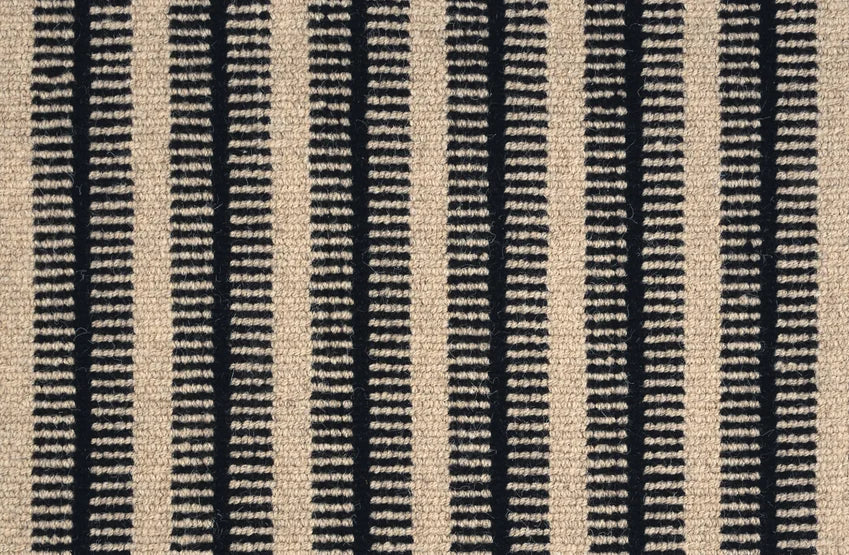 Broadloom carpet swatch in a striped pattern in a black cream design