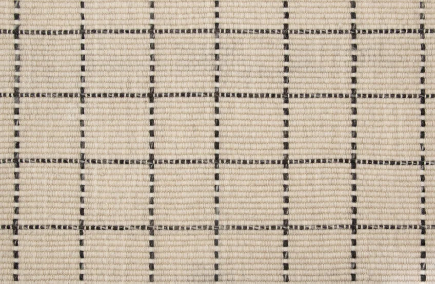 Broadloom carpet swatch in a checkered pattern in a black cream design