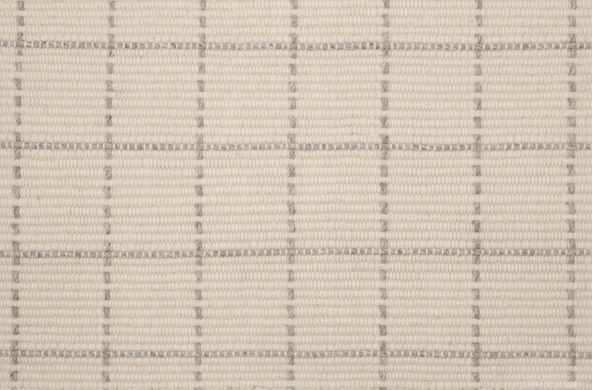 Broadloom carpet swatch in a checkered pattern in a light grey cream design