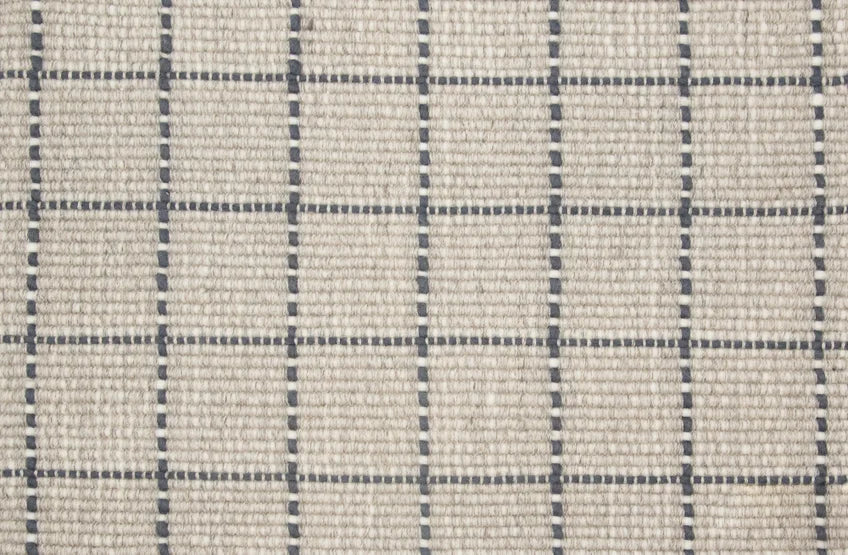 Broadloom carpet swatch in a checkered pattern in a light grey dark grey design