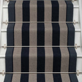 Striped flatweave runner in dark blue and grey on white staircase