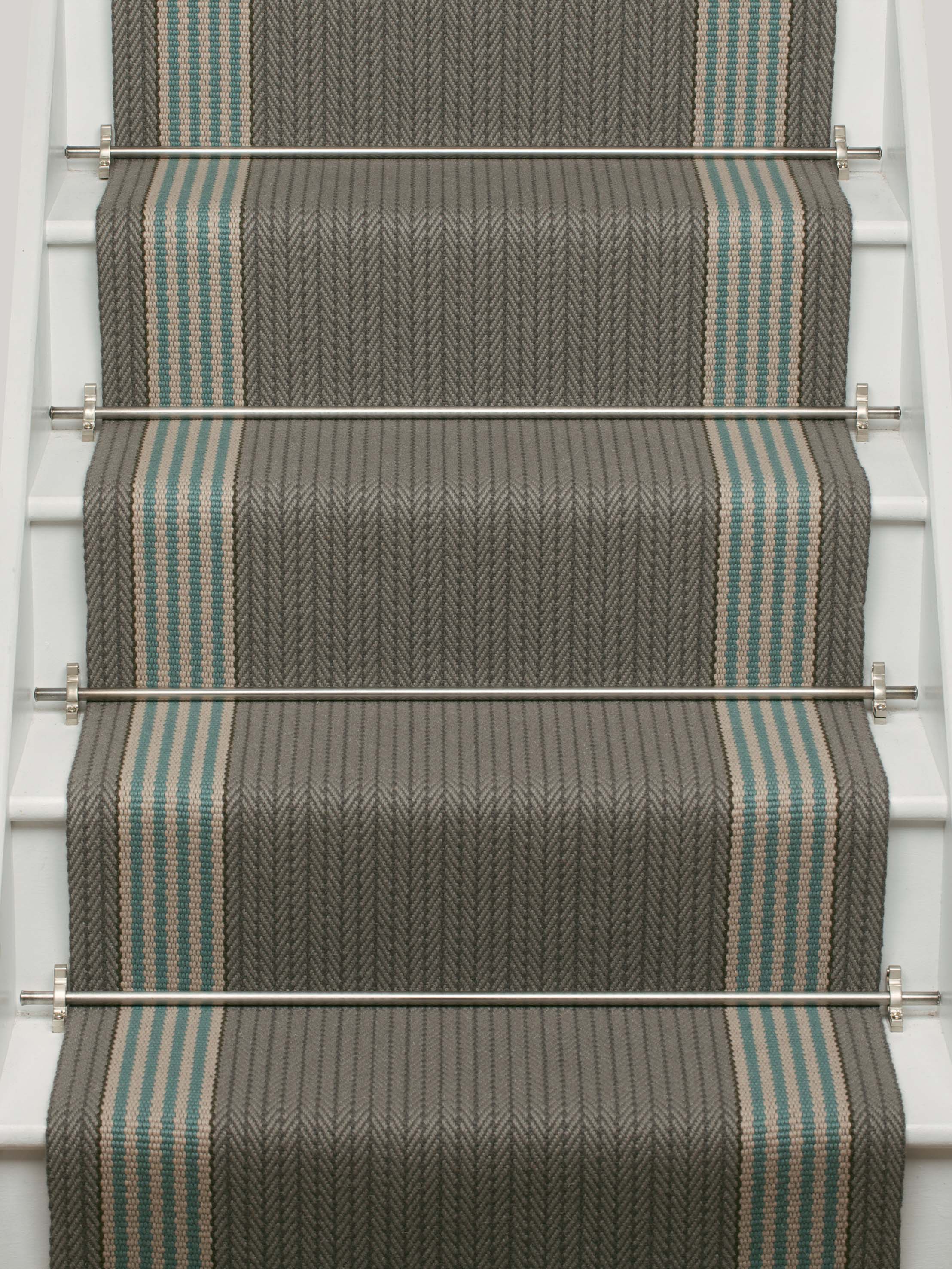 Striped flatweave runner in grey and blue on white staircase