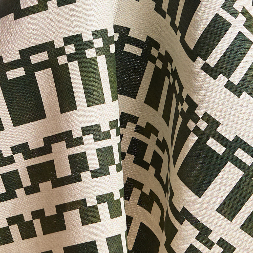 Fabric in a modernist checkerboard pattern in hunter green and cream.