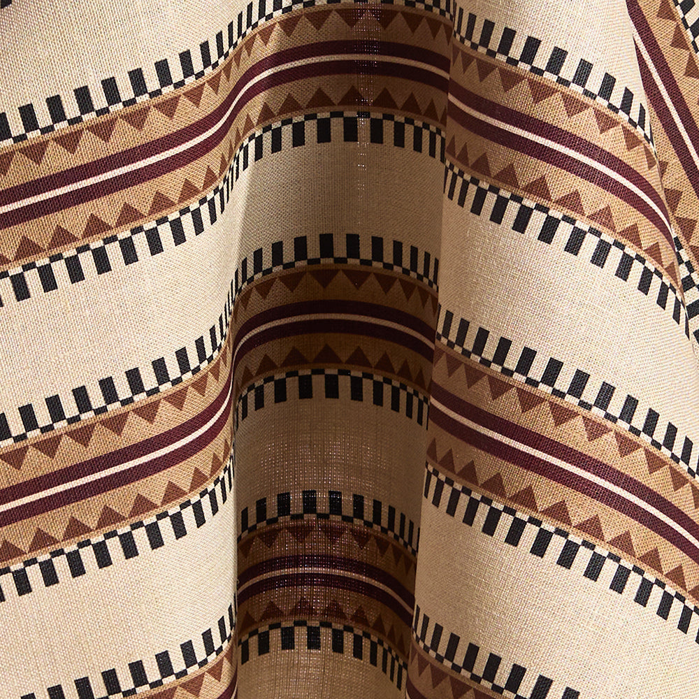 Fabric in a complex geometric stripe in maroon, ochre, ecru and black on a cream field.