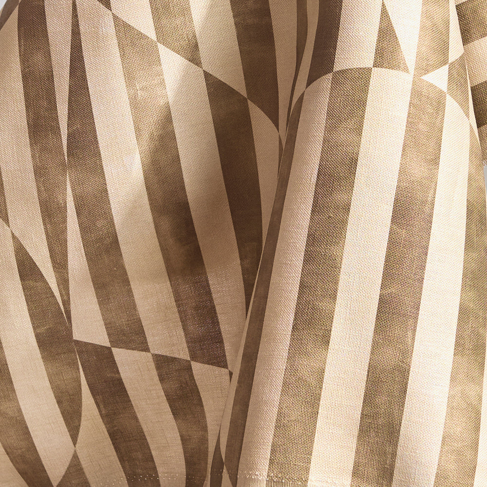 Draped fabric in a trompe l'oeil stripe pattern with geometric shapes in cream and taupe.