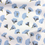 Floral pattern with blue flowers on a white background