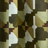Wallpaper in a bold abstract checkerboard pattern in brown, cream, sage and olive green.