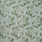 A close-up of a woven fabric pattern featuring a dense botanical leaf design in aqua blue with cream outline on a green field. 