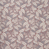 A close-up of a woven fabric pattern featuring a dense botanical leaf design in soft grey with warm pink outline on a grey-blue field. 