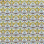 Patterned fabric with a gridded floral design in green, yellow and blue. 
