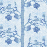 Detail of fabric in a linear tree and leaf print in navy on a light blue field.
