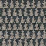 Detail of fabric in a linear leaf print in tan on a black field.