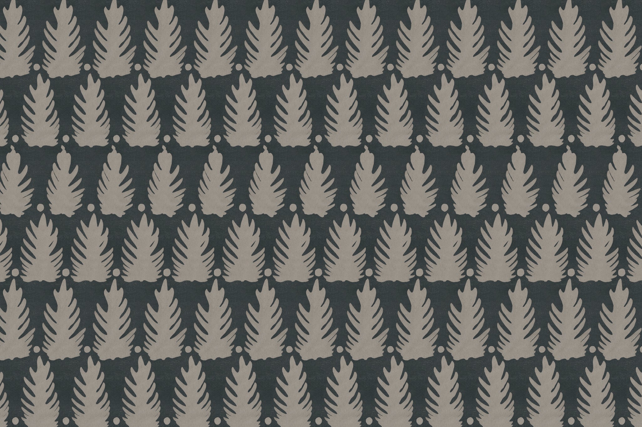 Detail of fabric in a linear leaf print in tan on a black field.