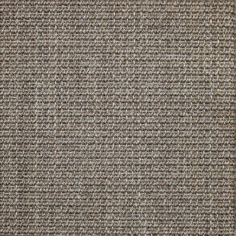 Broadloom carpet in textural woven sisal in cool taupe.