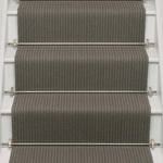 Striped flatweave runner in dark grey on white staircase