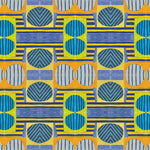 Close up of printed wallpaper with a complex geometric and striped pattern with yellow, blue, orange and pale blue. 