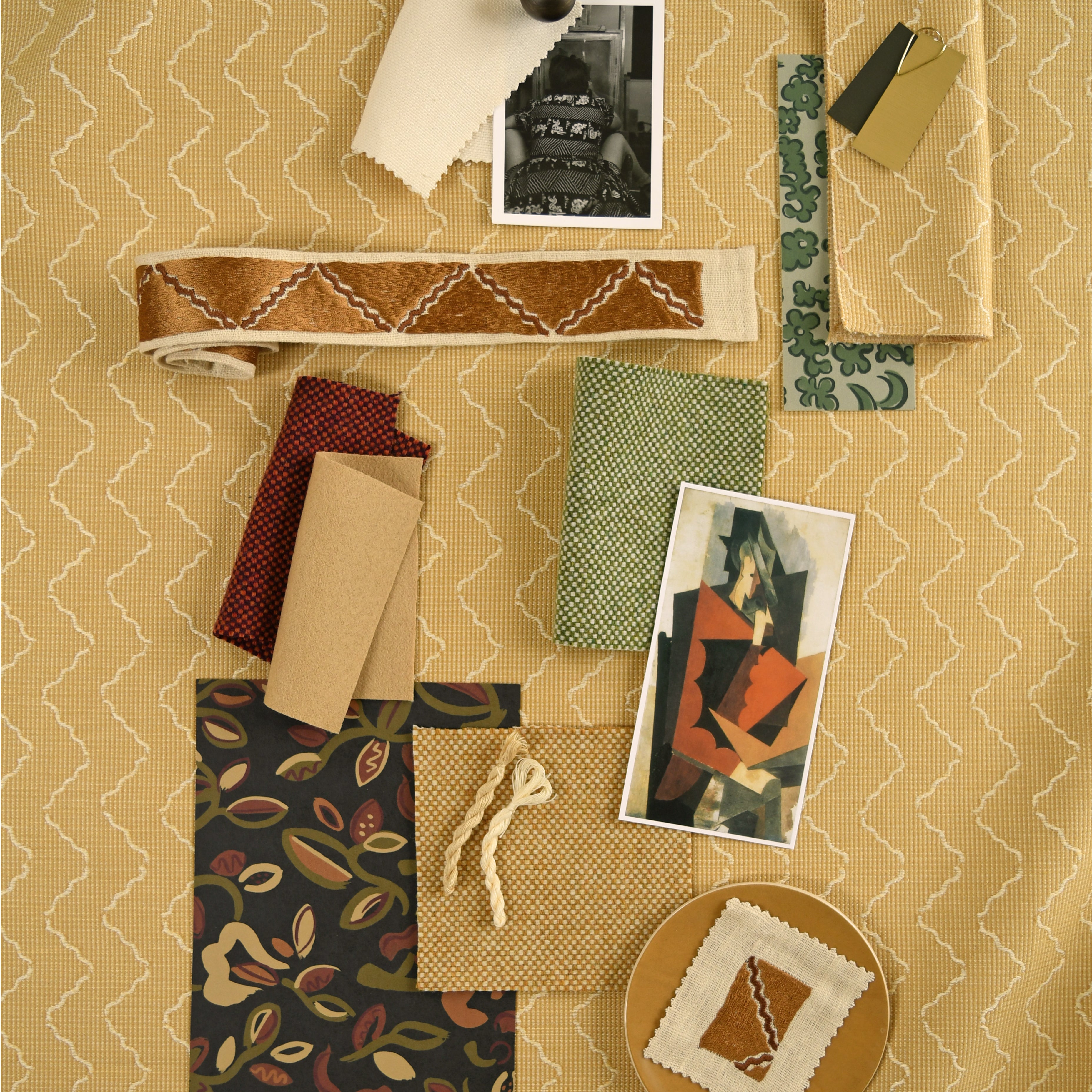 Moodboard with layered swatches of fabrics and inspiration images in palette of yellow, green and brown. 