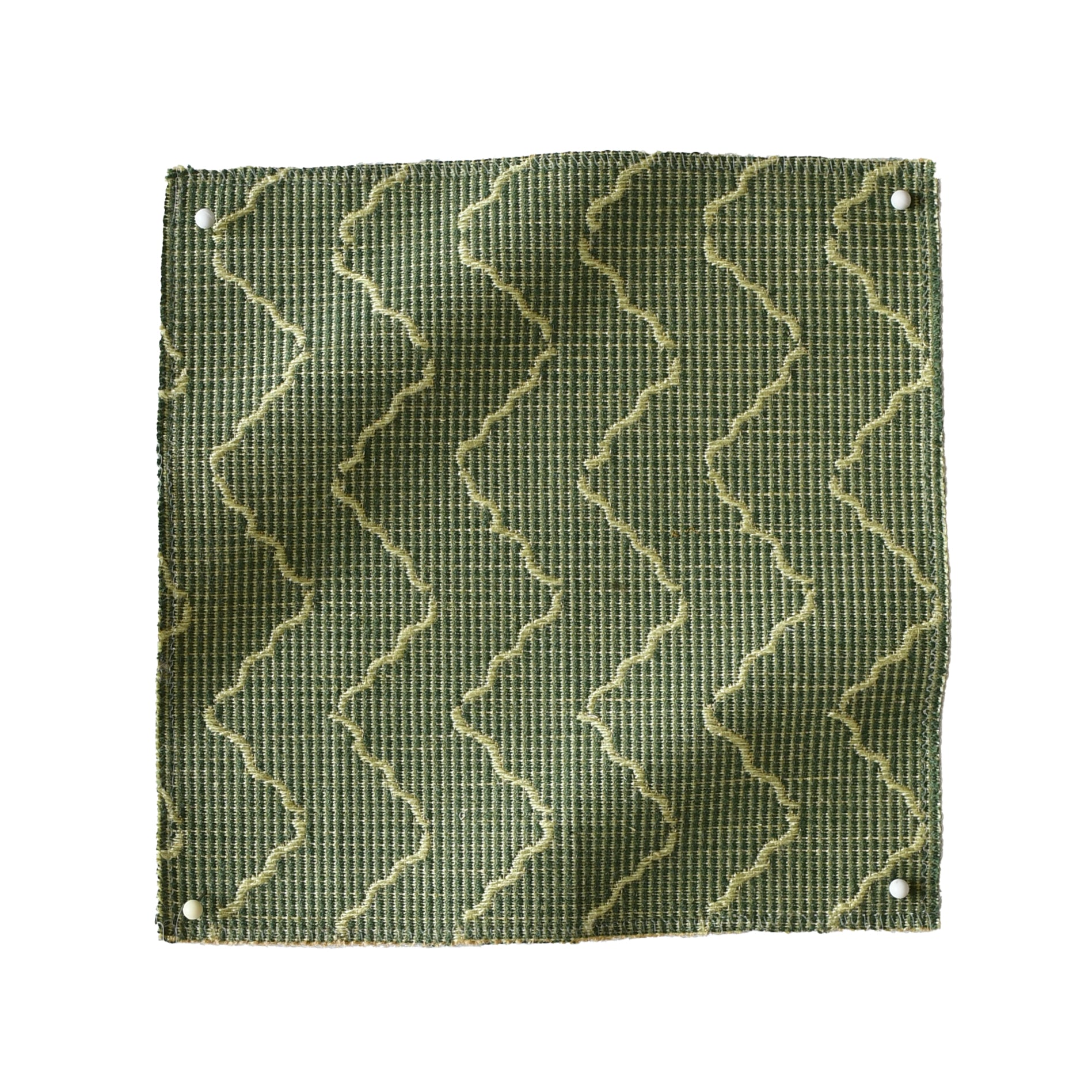 Pinned swatch of woven fabric with chevron stripe in green. 
