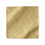 Pinned swatch of woven fabric with chevron stripe in yellow