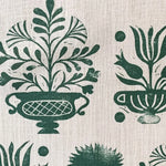 Green floral and leaf pattern on a beige background