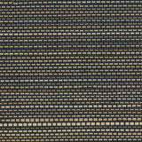 Detail of a grasscloth wallpaper panel with a textured weave in shades of grey, brown and black.