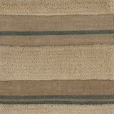 Handwoven rug in beige, cream and blue with raised cut pile stripes.