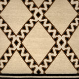 Close-up of a patterned rug with geometric design