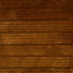 Handknotted rug in stripped shag in solid brown. 