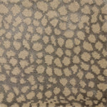 Handknotted rug with abstract animal motif in silver and cream