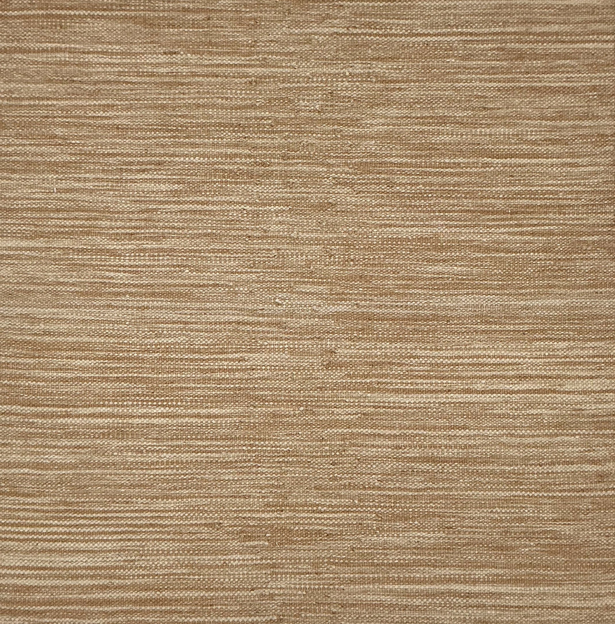 Textured flatweave rug in tan