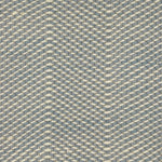 Textured flatweave rug with a blue and beige zigzag design