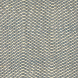 Textured flatweave rug with a blue and beige zigzag design