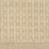 Textured beige checkerboard carpet 