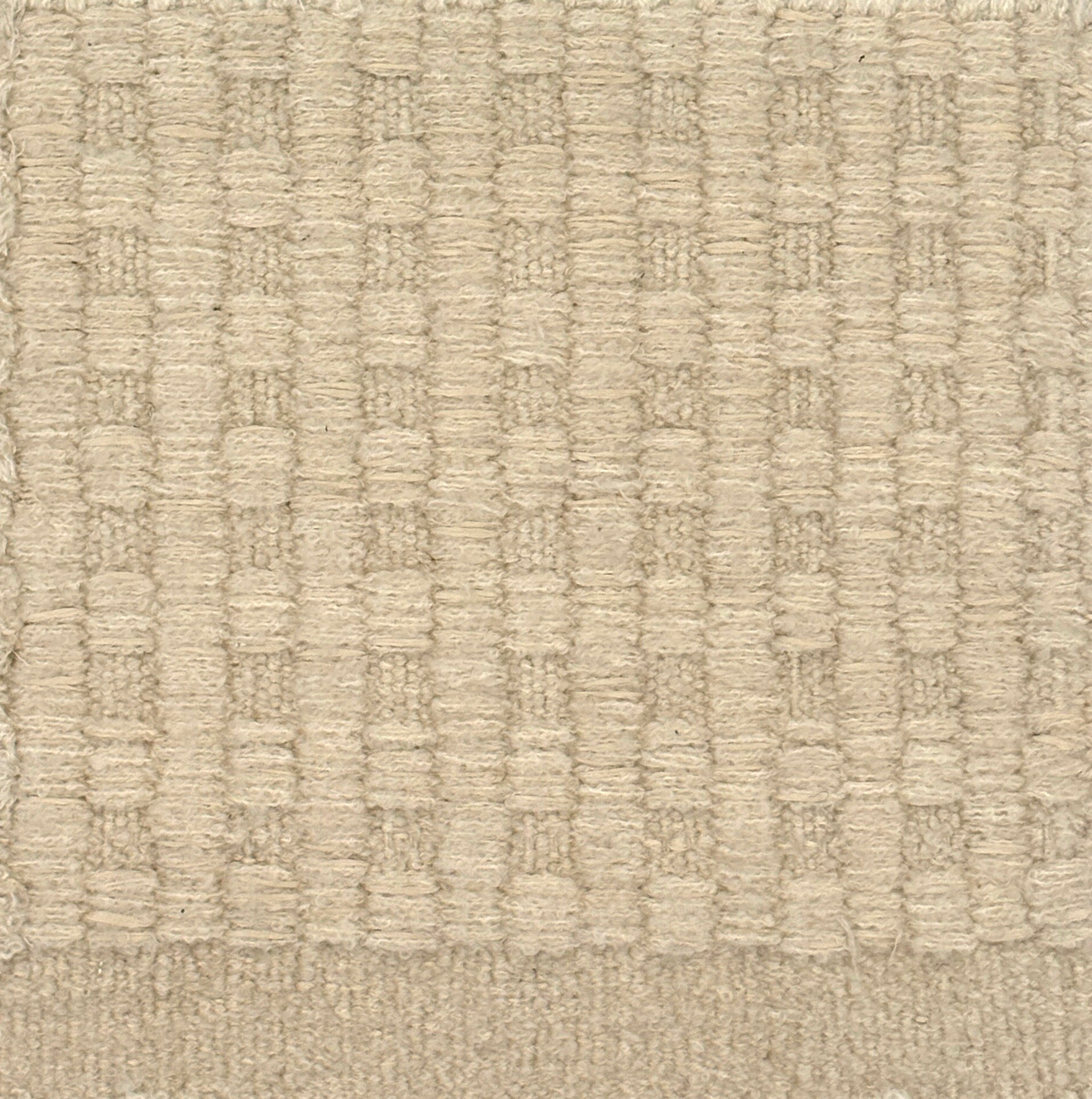 Textured beige checkerboard carpet 