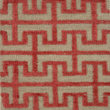 Flatweave rug with a geometric pattern in pink on a beige background